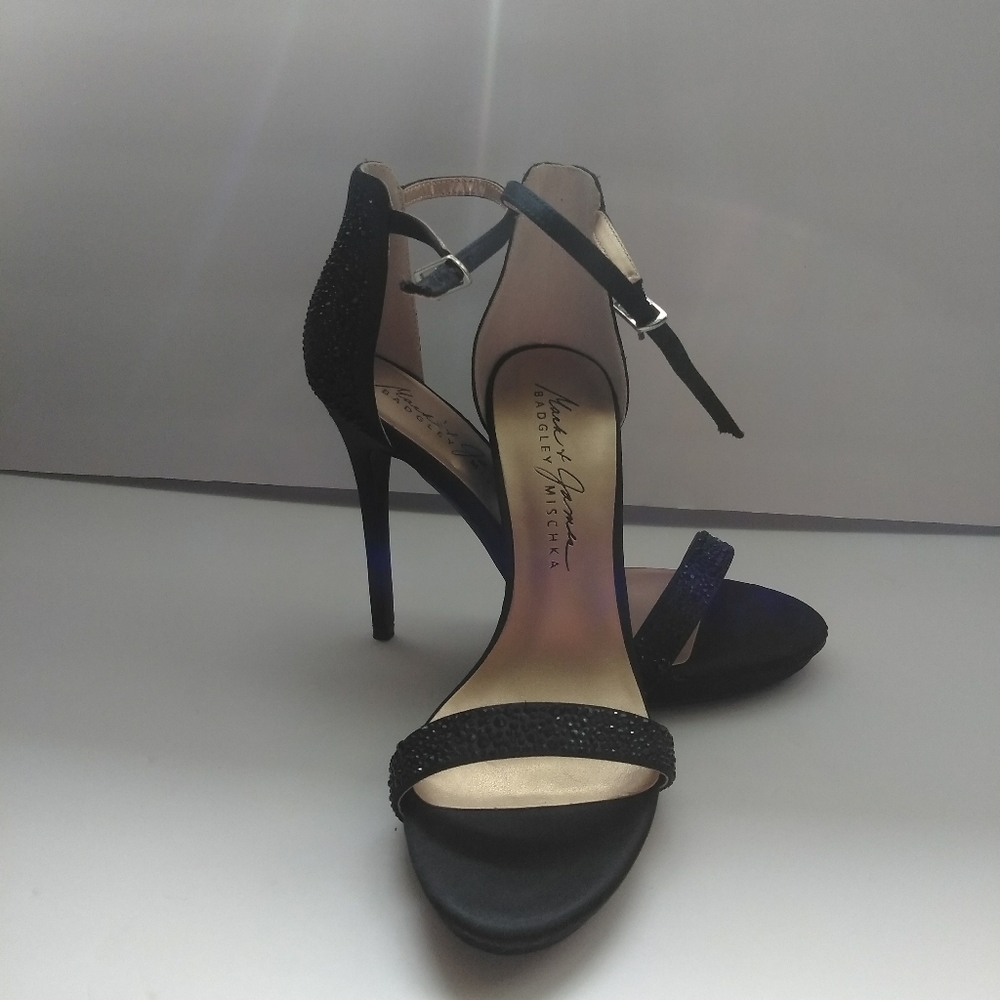 Black open toe strap on heels.